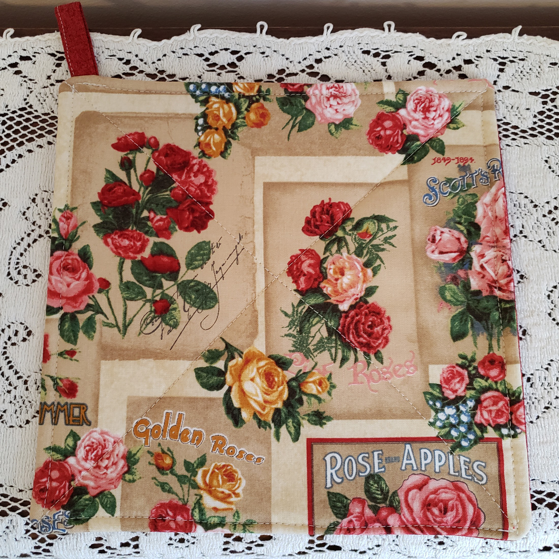 Potholders Rose p;rint with dark red back